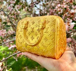 ✨ Elevate Your Space with the Gold LV Bag Candle! ✨