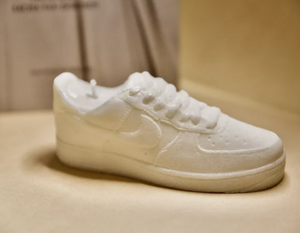 Unique and detailed Nike Air Force 1 Candle, a sneaker-shaped decorative sculpture candle. Crafted with precision, this high-quality candle adds a touch of urban flair to any space. Ideal gift for him, perfect for the holiday season. Limited stock availabl