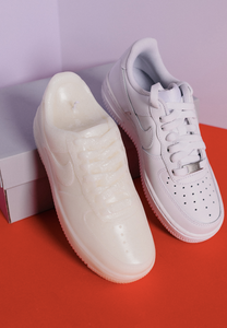 Unique and detailed Nike Air Force 1 Candle, a sneaker-shaped decorative sculpture candle. Crafted with precision, this high-quality candle adds a touch of urban flair to any space. Ideal gift for him, perfect for the holiday season. Limited stock availabl