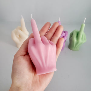 middle finger, candle, rebellion, protest, defiance, expression, gesture, humor, unconventional, statement, controversy, controversial, bold, irreverent, dissent, iconoclast, nonconformity, rebellious art, cheeky, symbolic, protest candle, counterculture, defiance symbol, edgy, unconventional design, cultural dissent, provocative, controversial art, rebellious spirit, bold statement.