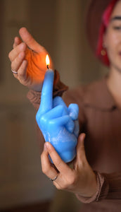 middle finger, candle, rebellion, protest, defiance, expression, gesture, humor, unconventional, statement, controversy, controversial, bold, irreverent, dissent, iconoclast, nonconformity, rebellious art, cheeky, symbolic, protest candle, counterculture, defiance symbol, edgy, unconventional design, cultural dissent, provocative, controversial art, rebellious spirit, bold statement.