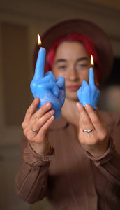 middle finger, candle, rebellion, protest, defiance, expression, gesture, humor, unconventional, statement, controversy, controversial, bold, irreverent, dissent, iconoclast, nonconformity, rebellious art, cheeky, symbolic, protest candle, counterculture, defiance symbol, edgy, unconventional design, cultural dissent, provocative, controversial art, rebellious spirit, bold statement.