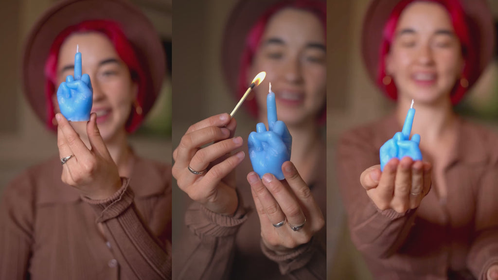  middle finger, candle, rebellion, protest, defiance, expression, gesture, humor, unconventional, statement, controversy, controversial, bold, irreverent, dissent, iconoclast, nonconformity, rebellion, unconventional art